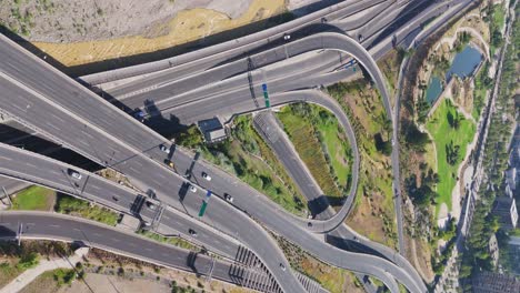 aerial view of highway junction roads beside bicentenario park in santiago, chile