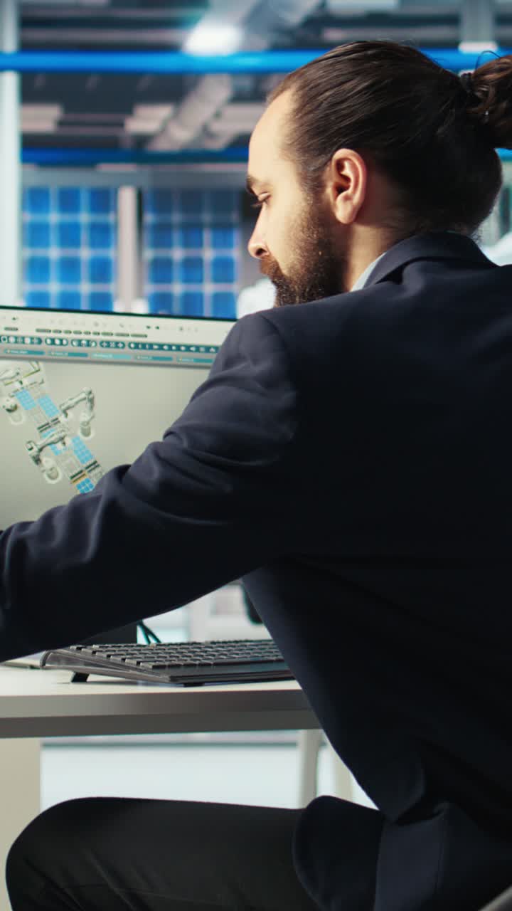 Vertical Video Photovoltaics Factory Engineer Looking Over Paperwork Documents, Analyzing Data