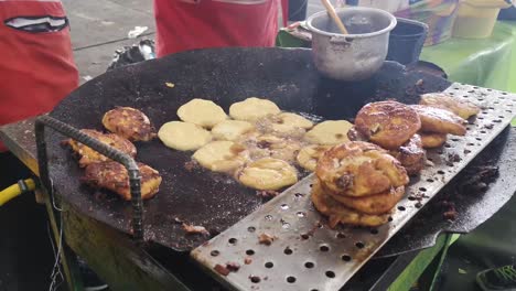 traditional ecuadorian street food recipe prepared with fried corn in clay pot