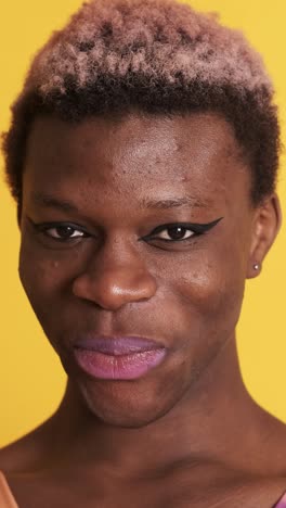 two multiethnic transgender people looking at the camera with a serious look