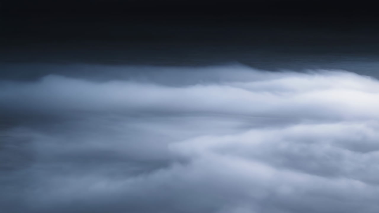 Soft Low Cloud Bank Sweeping Across Dark Horizon, Gentle Billows And Silky Texture Evoke Calm Nocturnal