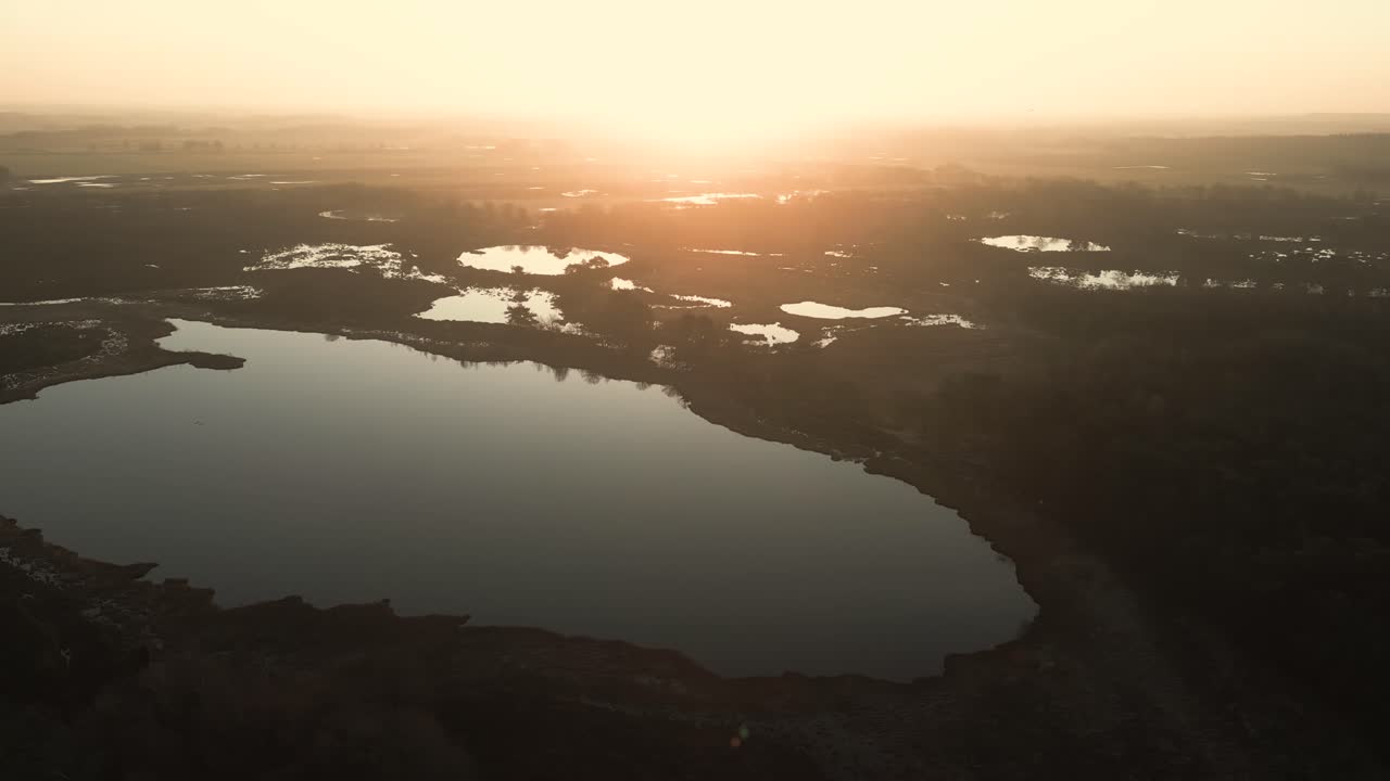 Sunrise over a Misty Bog