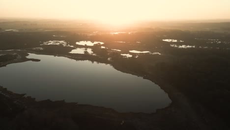 sunrise over a misty bog