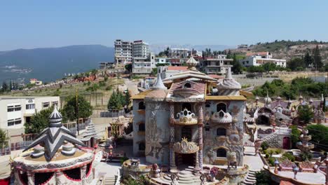 aerial view of bakhoun castle in the village of bakhoun in dennieh casa, lebanon - drone shot