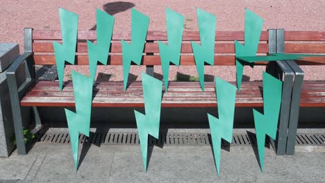 cut-out lightning bolts inspired by the polish women's power movement are seen on a bench during a demonstration to protest against the extreme right and fascist movements in europe