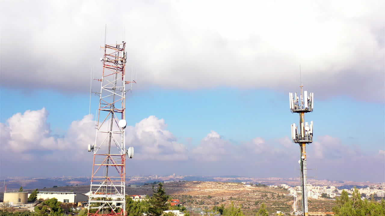 Aerial footage Close to Radio and cellular Antenna With blue sky