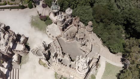 aerial view of a castle-like structure in a park