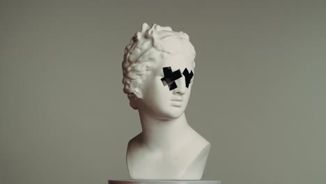 classical bust with censored eyes