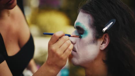 applying zombie makeup