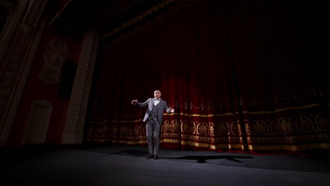 motivational speaker. male actor on classic theatre stage.