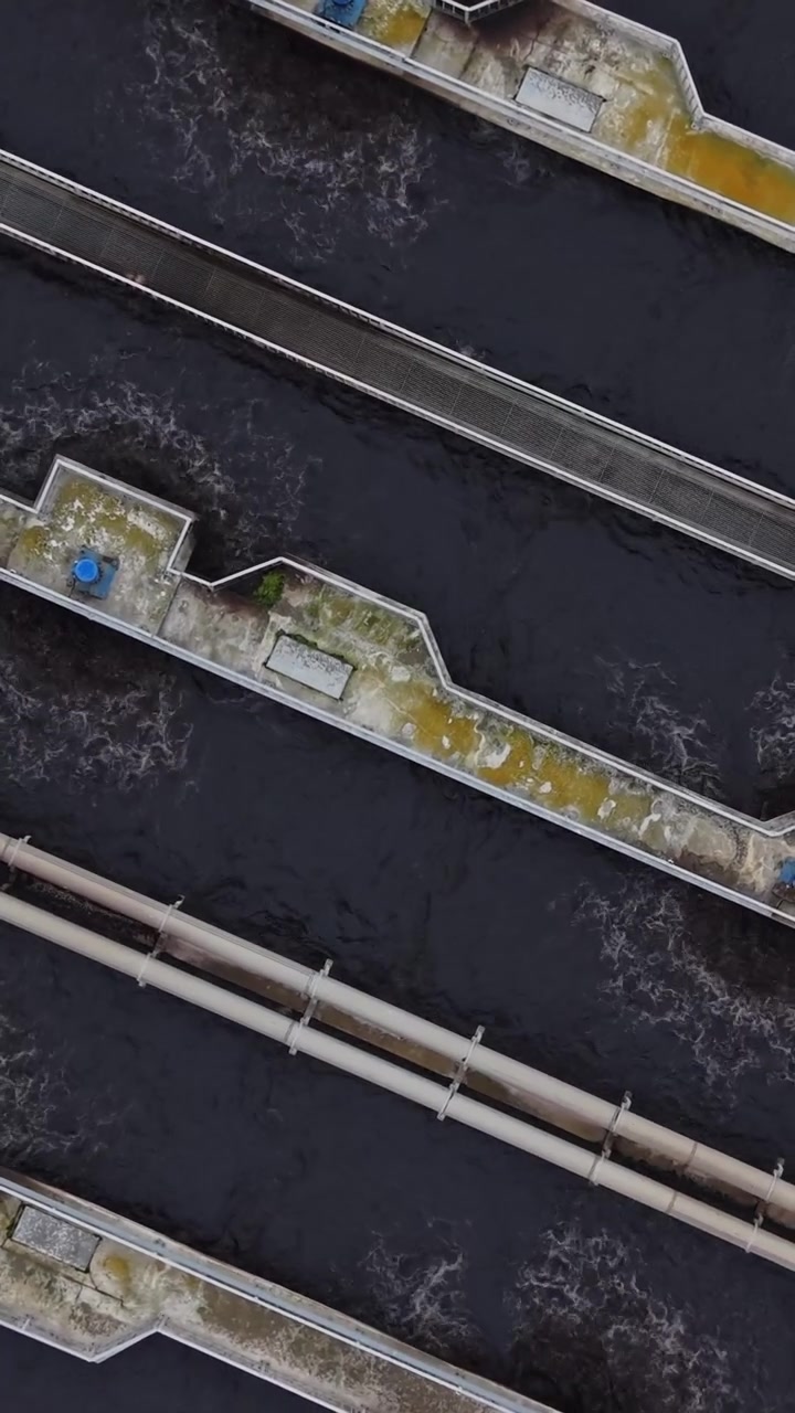Water treatment facility shows tanks and pipelines in operation