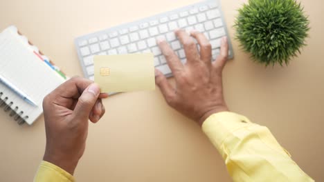 person using credit card for online payment.