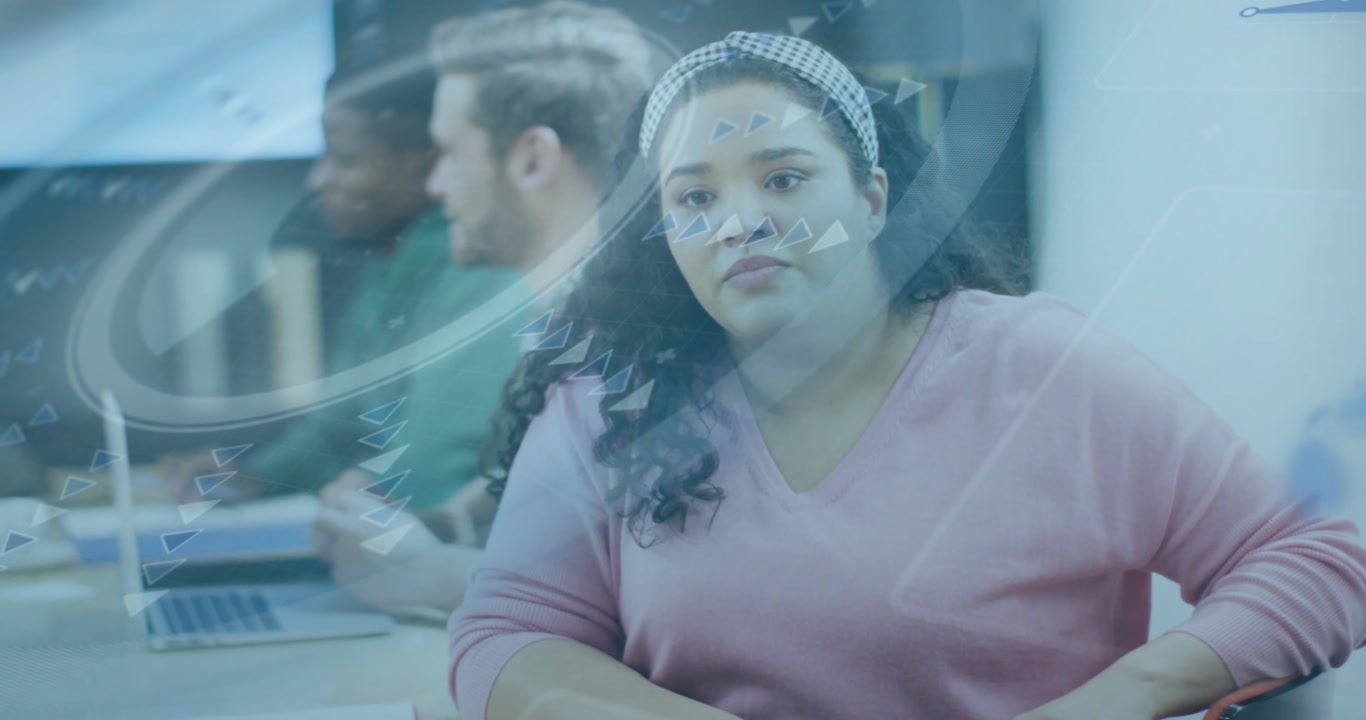 Mid adult woman raising hand at business meeting and guiding teamwork with drifting UI overlays