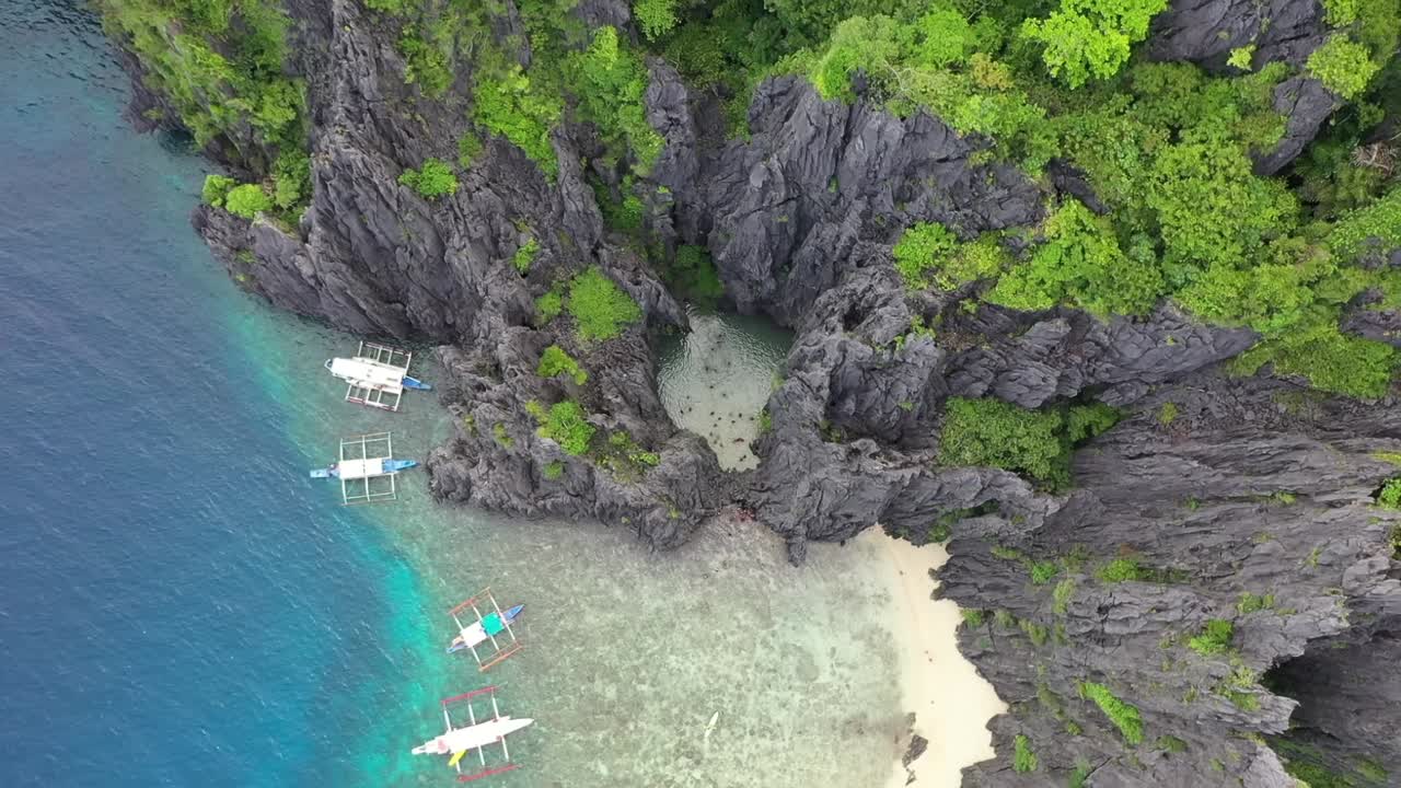 Aerial view of beautiful karst scenery and turquoise ocean water around El Nido, Palawan, Philippines