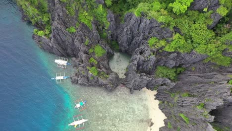 aerial view of beautiful karst scenery and turquoise ocean water around el nido, palawan, philippines