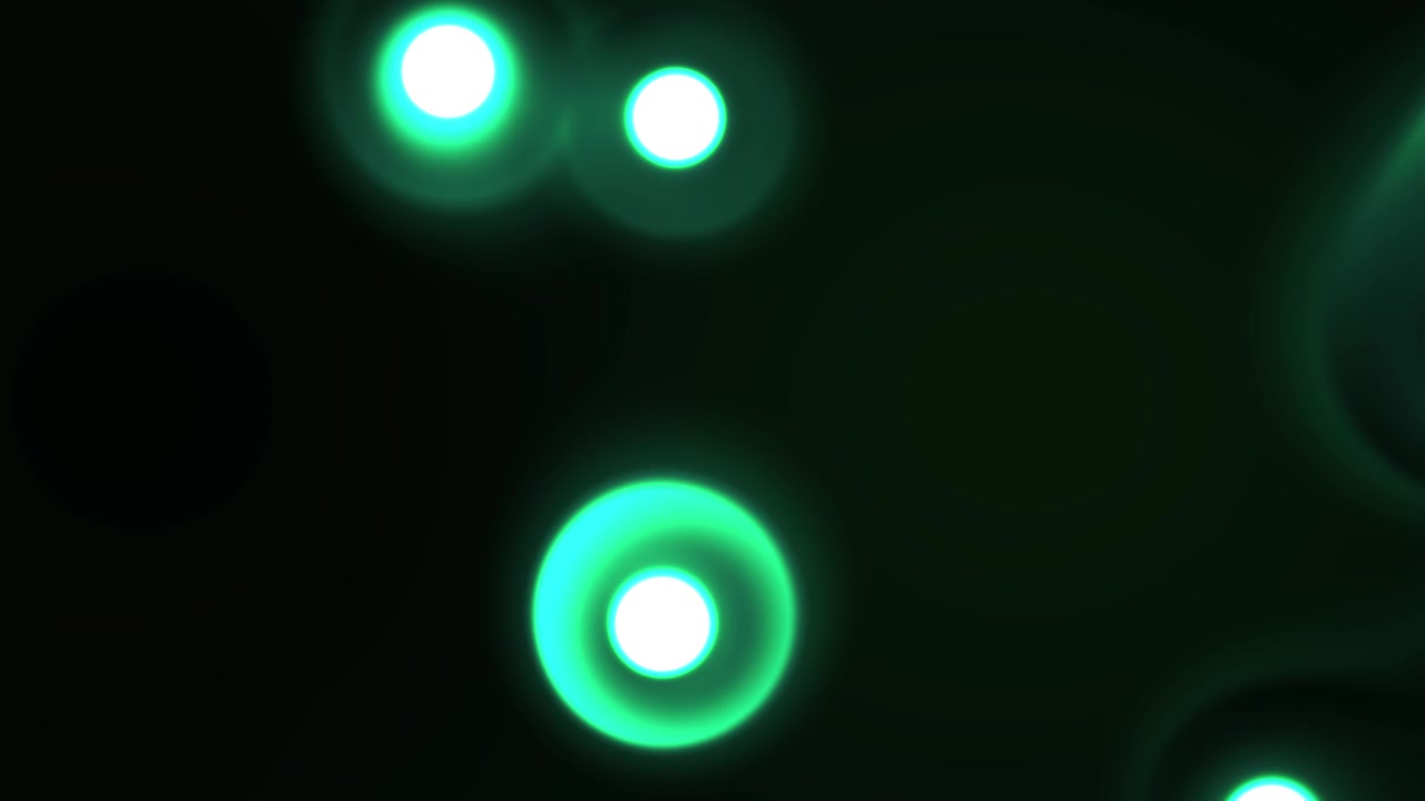 Abstract Green Glowing Orbs Moving on Dark Background