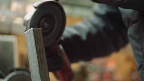 angle grinder cutting metal at workshop