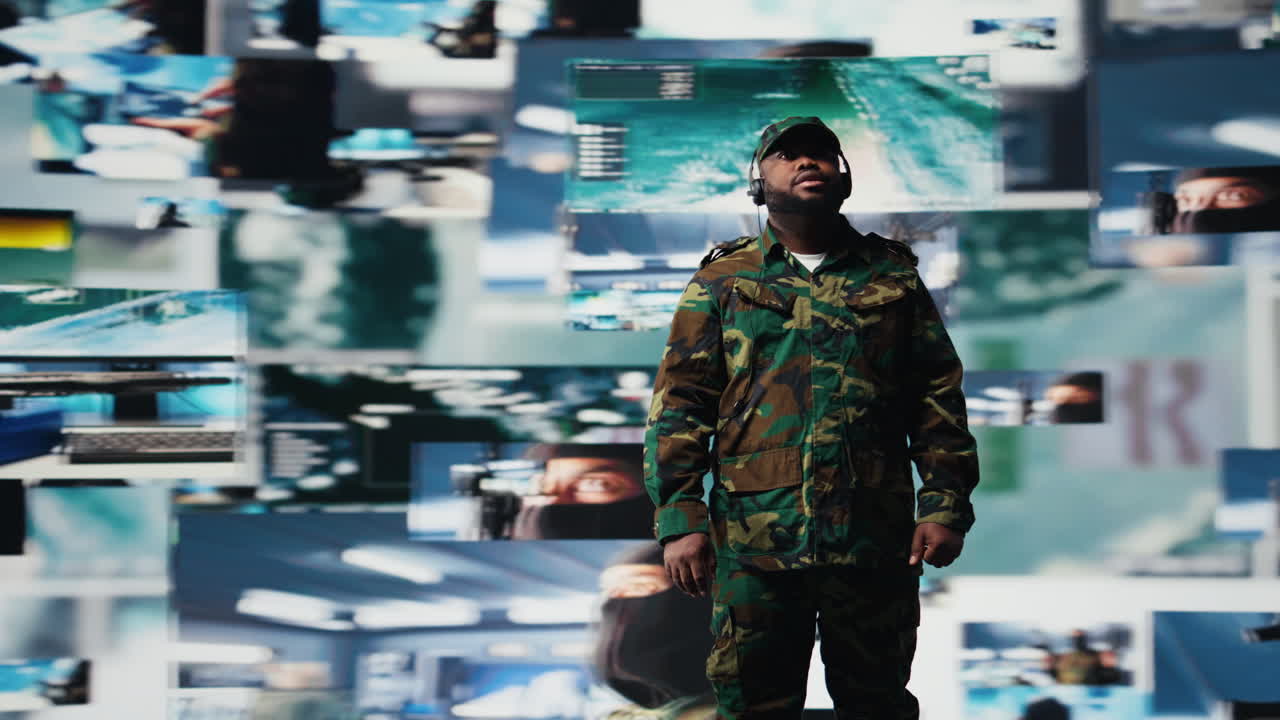 Black veteran reviewing battlefield data in a high tech command center