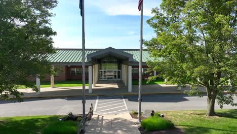 School-entrance,-low-angle-aerial