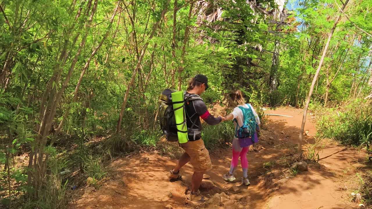 Hiking Couple in a Lush Forest