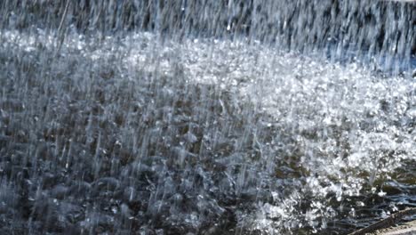 large volume of water dripping into tank