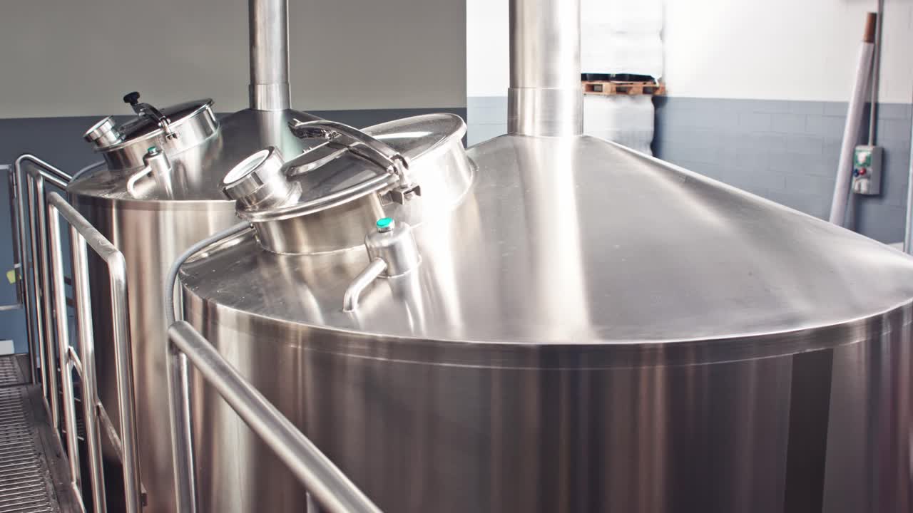 Metallic vats in brewery. Close up.
