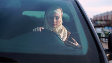 woman driver using phone
