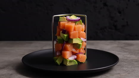 diced salmon, avocado, and red onion dish