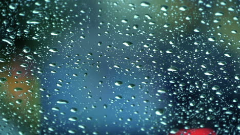 Rain-Window-Texture---Full-Frame-Background-Showing-A-Window-With-Raindrops-Rolling-Off---close-up