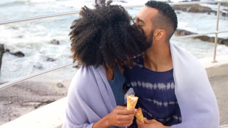 couple kissing each other at beach 4k