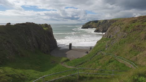 big sea swell and waves at tra na mbno bunmahon copper coast waterford at spring tides