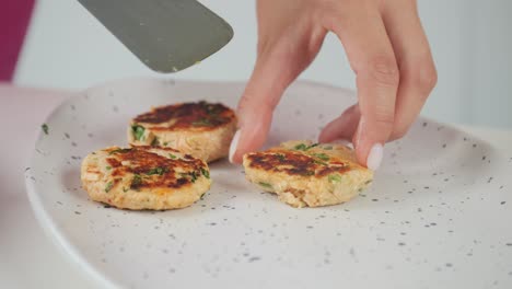 plating fresh made crab cakes