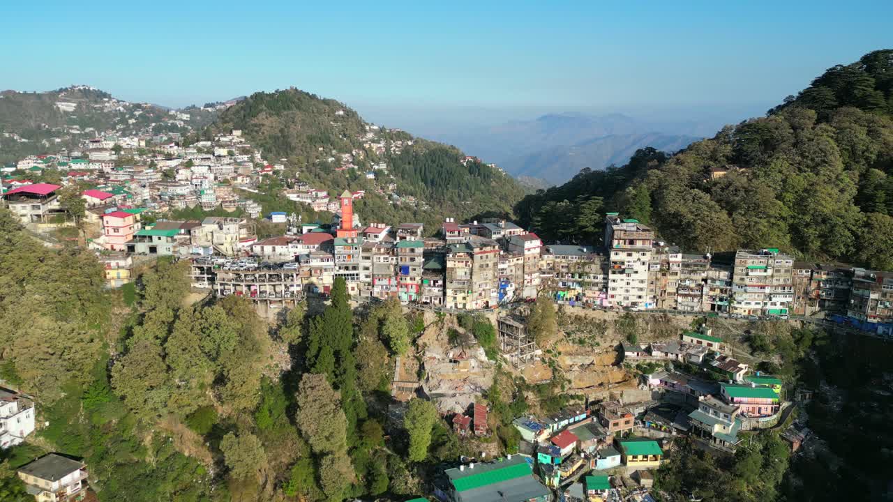 colorful buldings on hills in mussoorie drone view in india