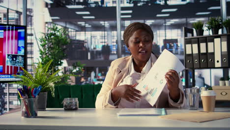 businesswoman presenting data in an office