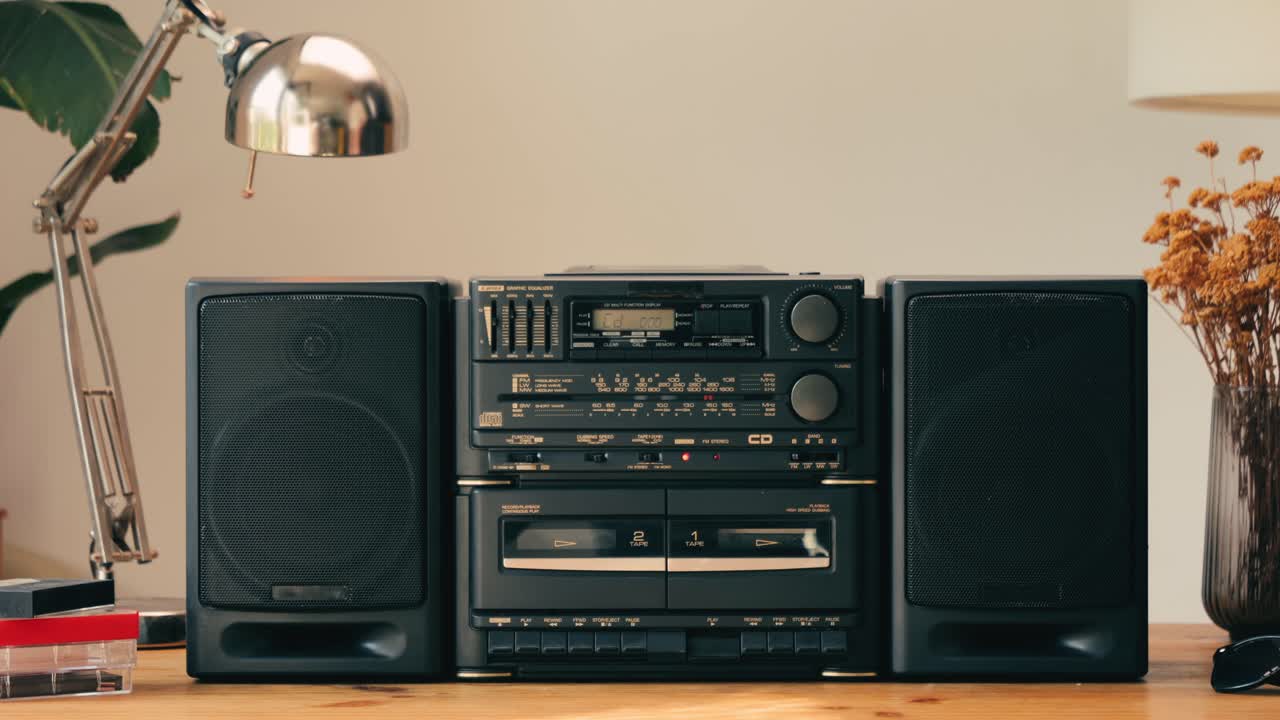 Retro radio tape recorder, audio cassette close-up. Listening to music, old radio boom box player, macro of vintage music listening. . High quality 4k footage