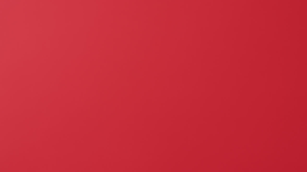 산타클로스가  ⁇ 은 배경 위에 선물을 들고 손을  ⁇ 고 있다