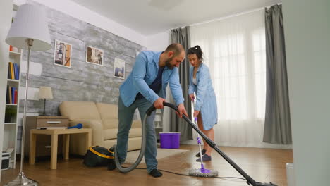 Low-angle-cleaning-the-apartment