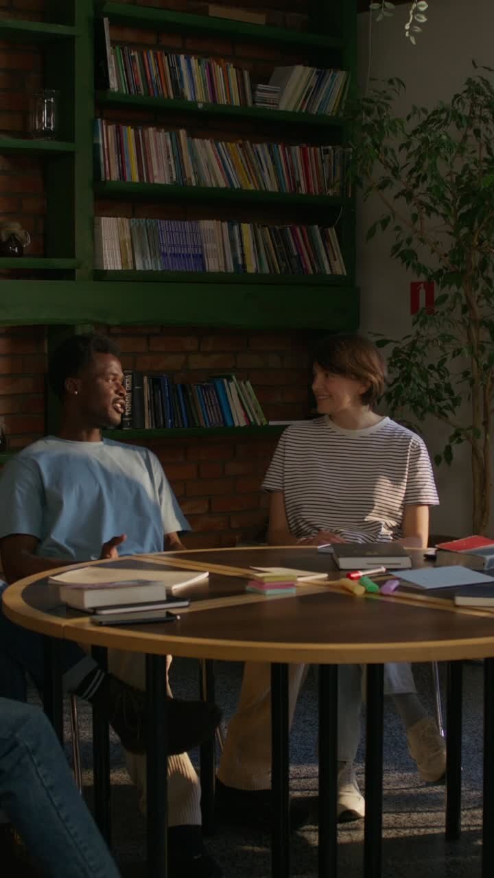 People in a meeting around a table
