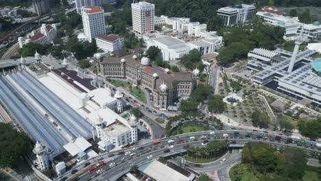 flight over kuala lumpur city palace traffic streets, sunny day aerial panorama 4k malaysia