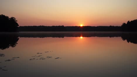 sunrise over peaceful lake