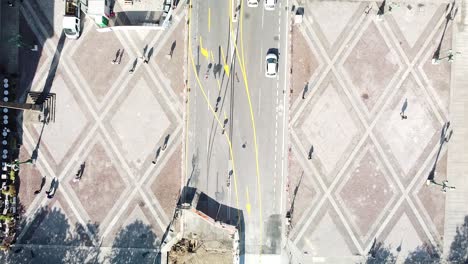 Yellow-lines-on-street-due-to-construction-in-downtown-Bergamo,-aerial-top-down-view