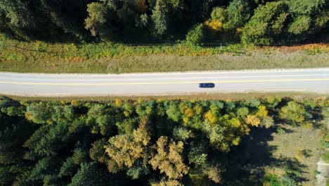 aerial view of vehicle moving on road at countryside 4k