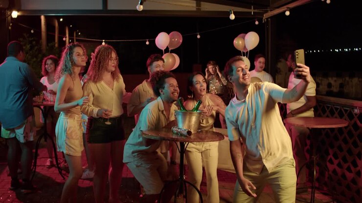 Friends Celebrating and Having Fun at a Night Party