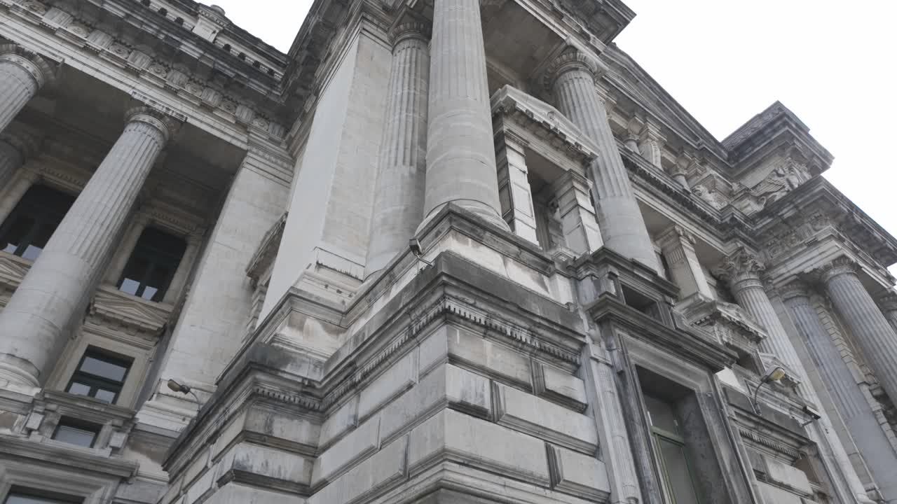 Low angle view highlighting the columns of the Palace of Justice in Brussels.