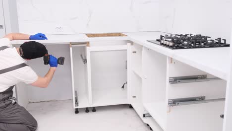 furniture repairman installing furniture