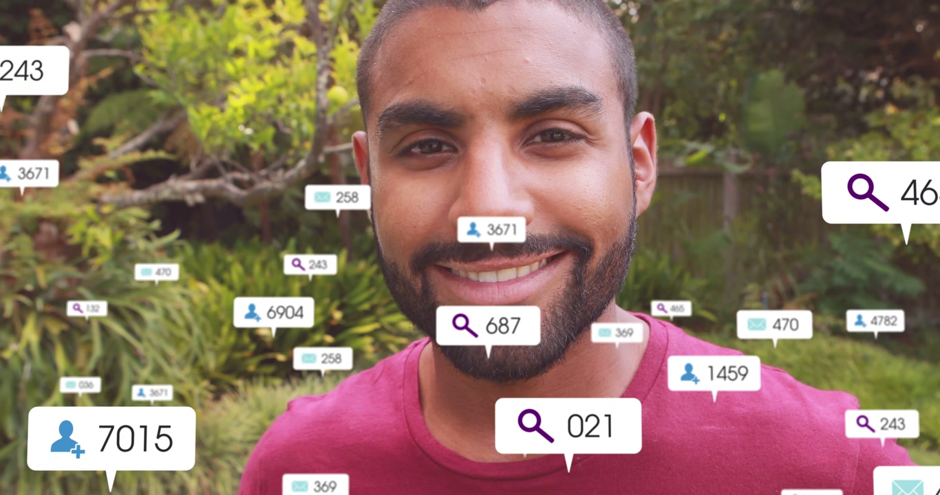 Man Smiling as Social Media Notifications Appear Around Him