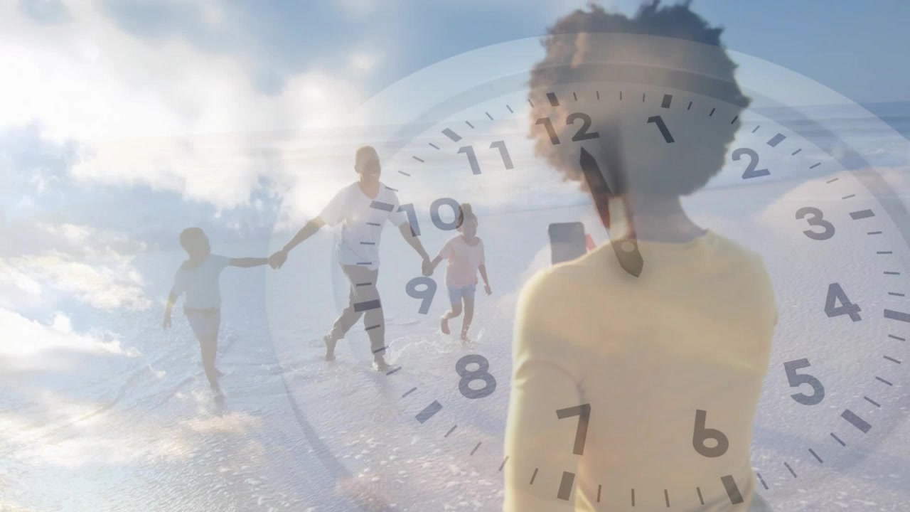 Mother holding smartphone starting clock overlay while father leading kids trotting for marketing