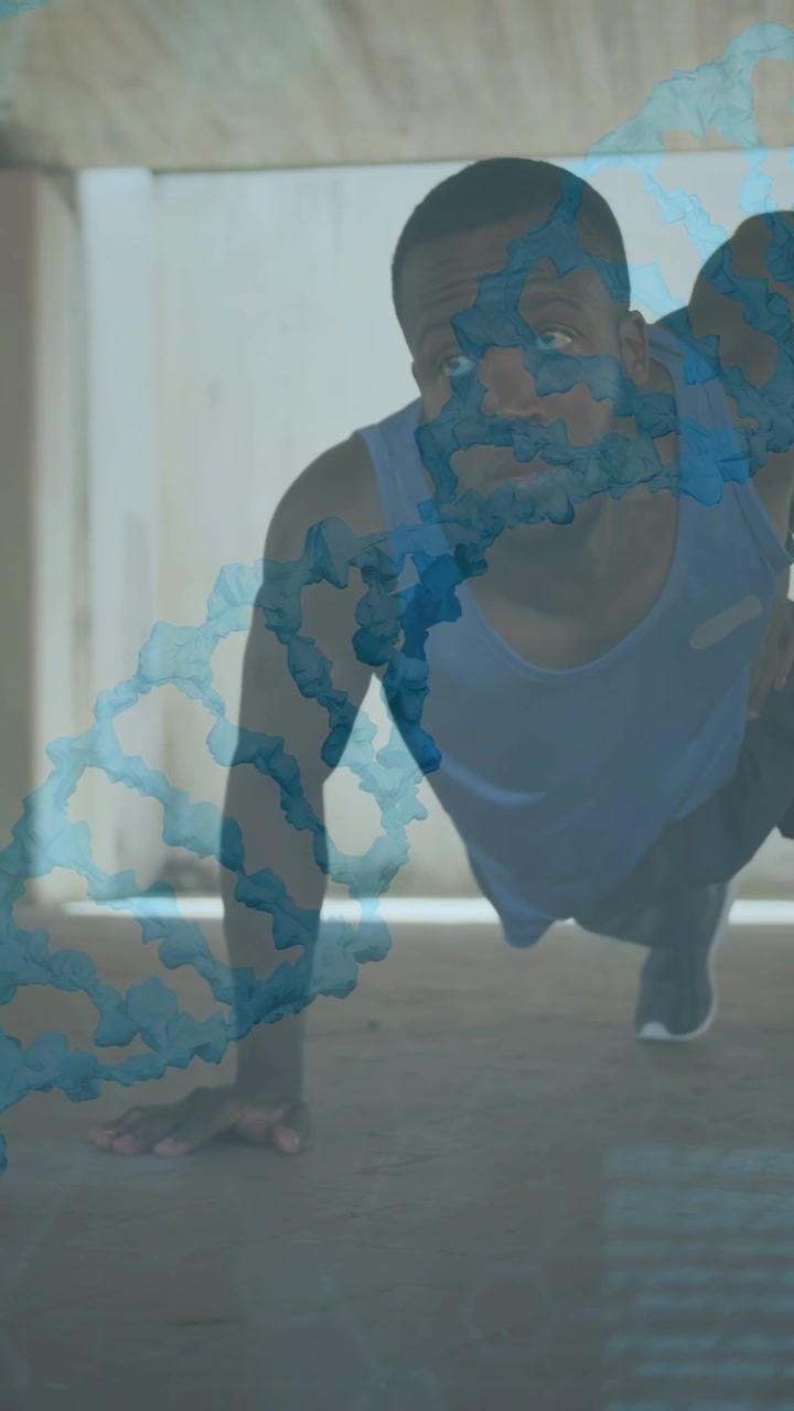 Video verticale: Uomo che appoggia la mano e poi si spinge dal pavimento sotto il letto, con un'elica di DNA fluttuante per la salute.