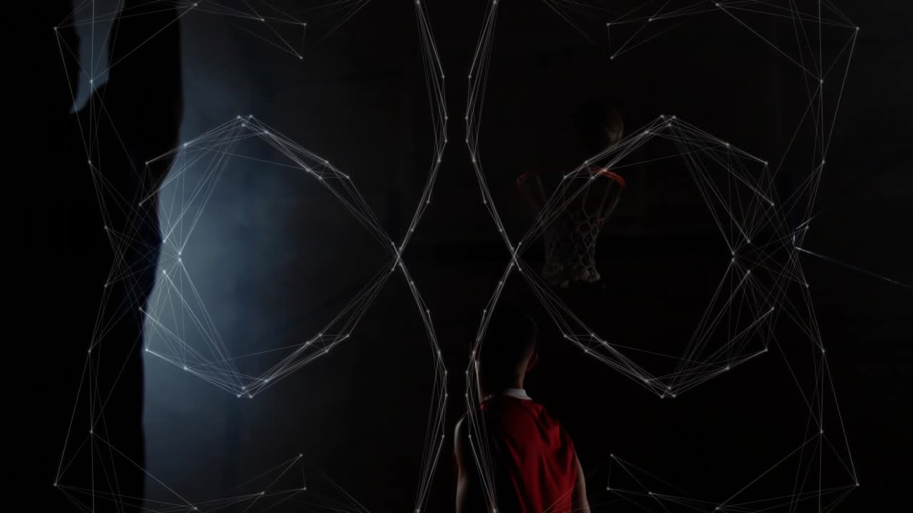 Male player raising arm activating sphere morphing into cylinder for basketball training under hoop