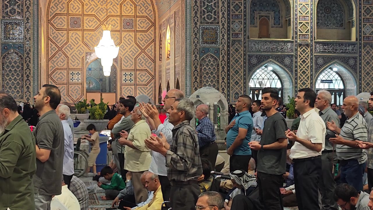 Group of Men Praying Inside a Mosque
